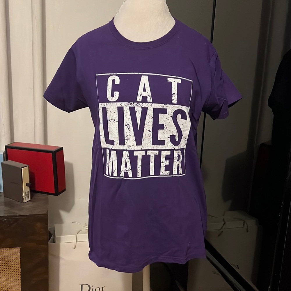 Adopt don’t shop campaign tee shirt.